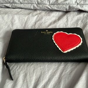 Black leather Kate Spade wallet with red heart